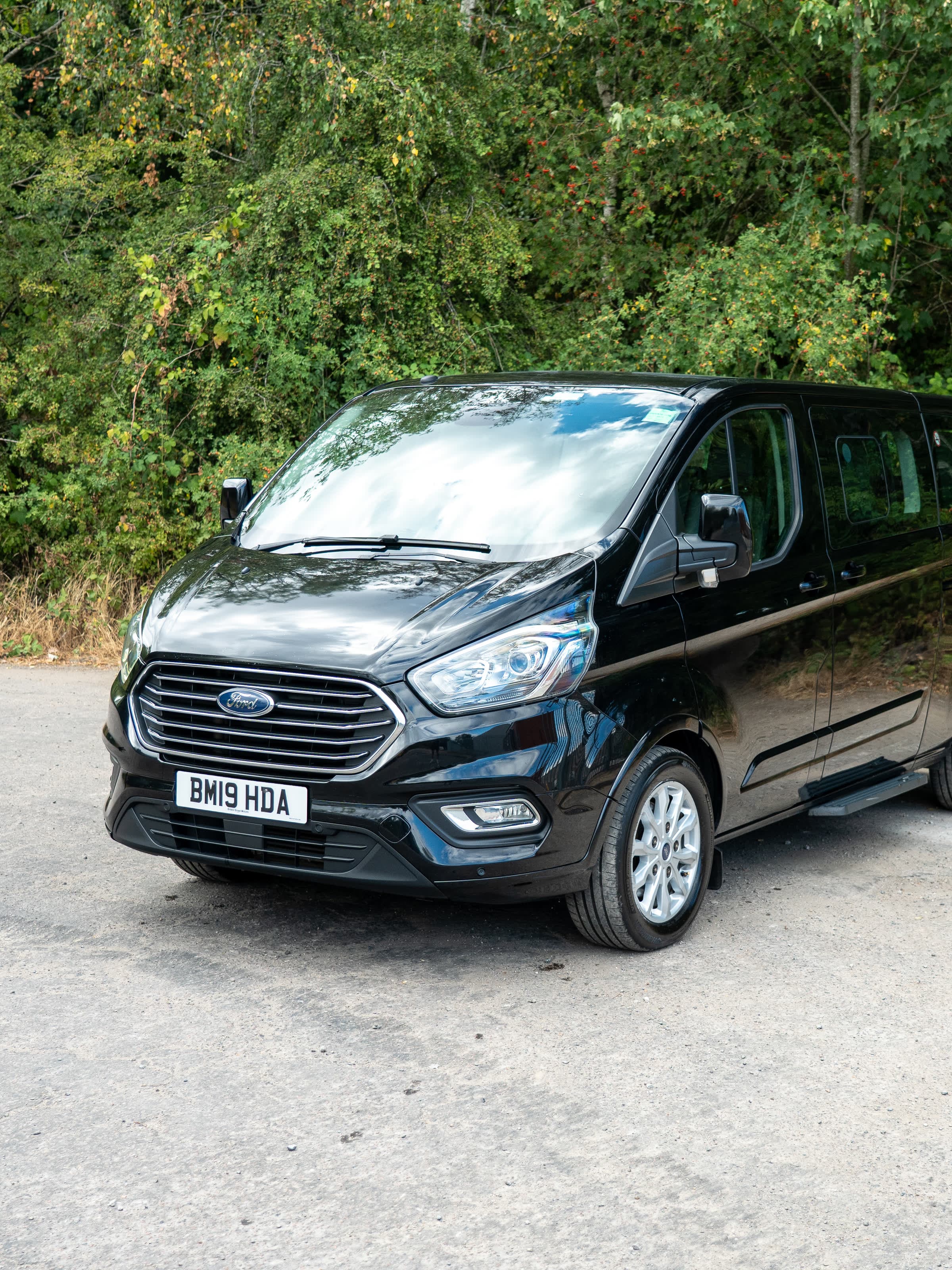 The SC Auto Solutions black Ford Tourneo collection vehicle